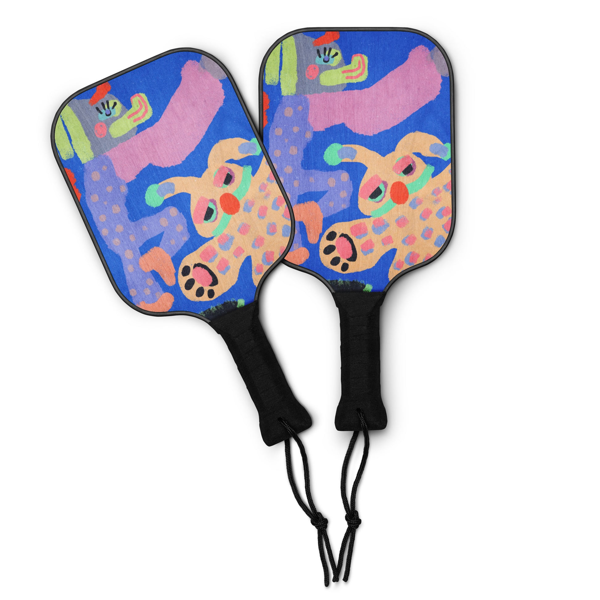 Artistic paddleball set with "chaotic-cute animal" print on wooden paddles, perfect for beach or park games, comes with neon balls and a clear carry bag.