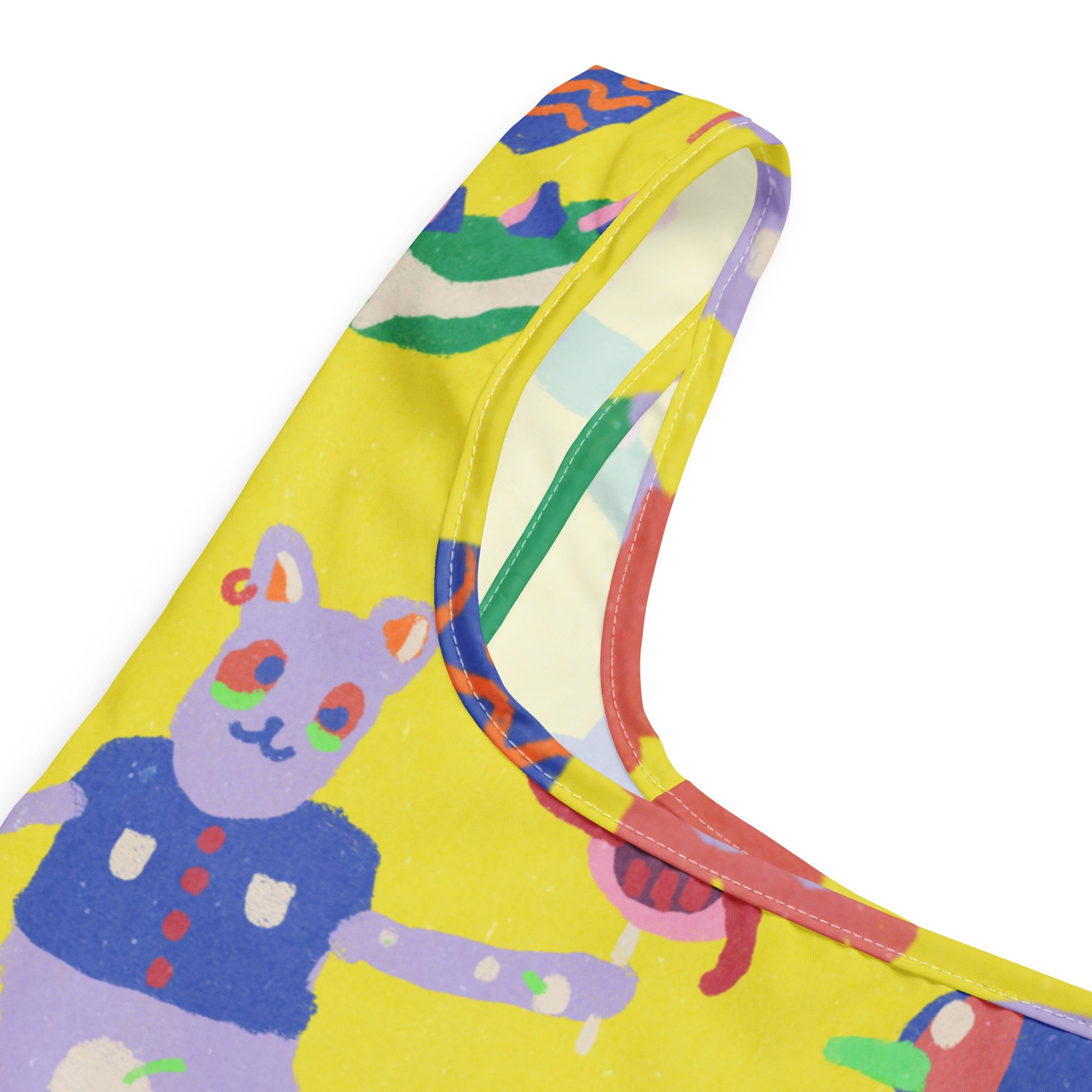 Reusable yellow shopping bag with a burnout-style texture and built-in handles, designed to replace plastic bags.