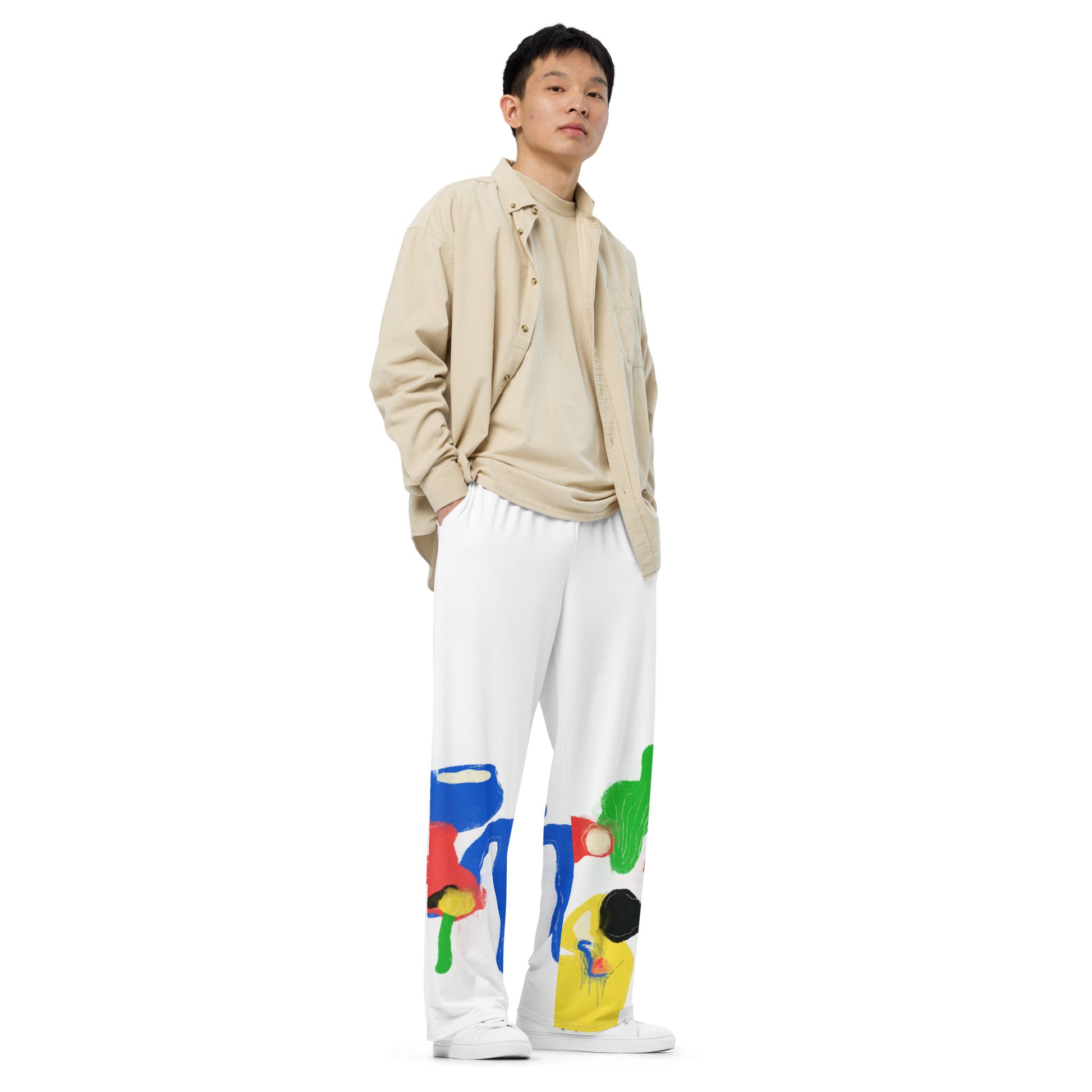 Unisex wide-leg pants with colorful abstract all-over print, featuring elastic waistband and relaxed fit.
