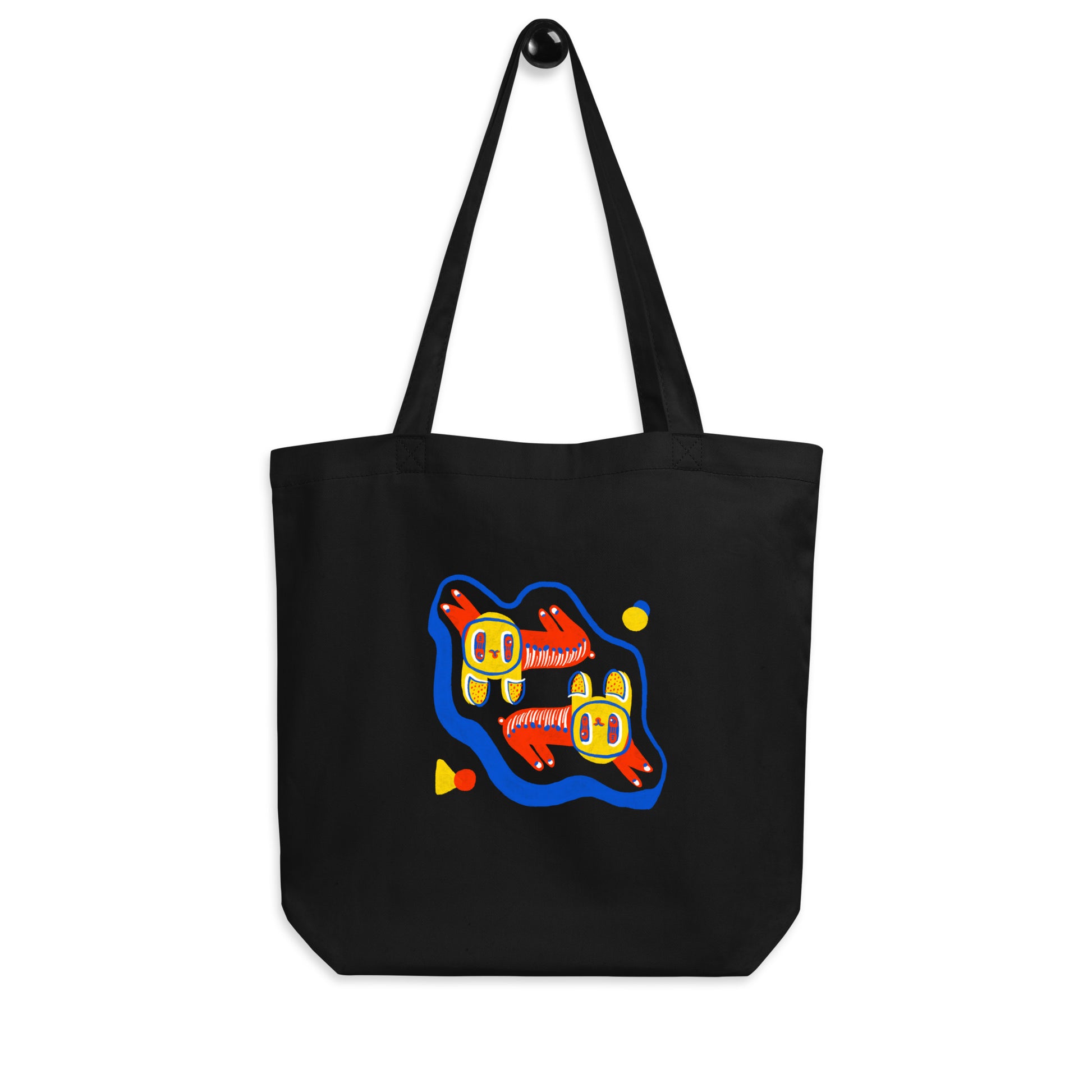 Eco tote bag made of organic cotton, featuring a cheerful twin cats illustration on the front.