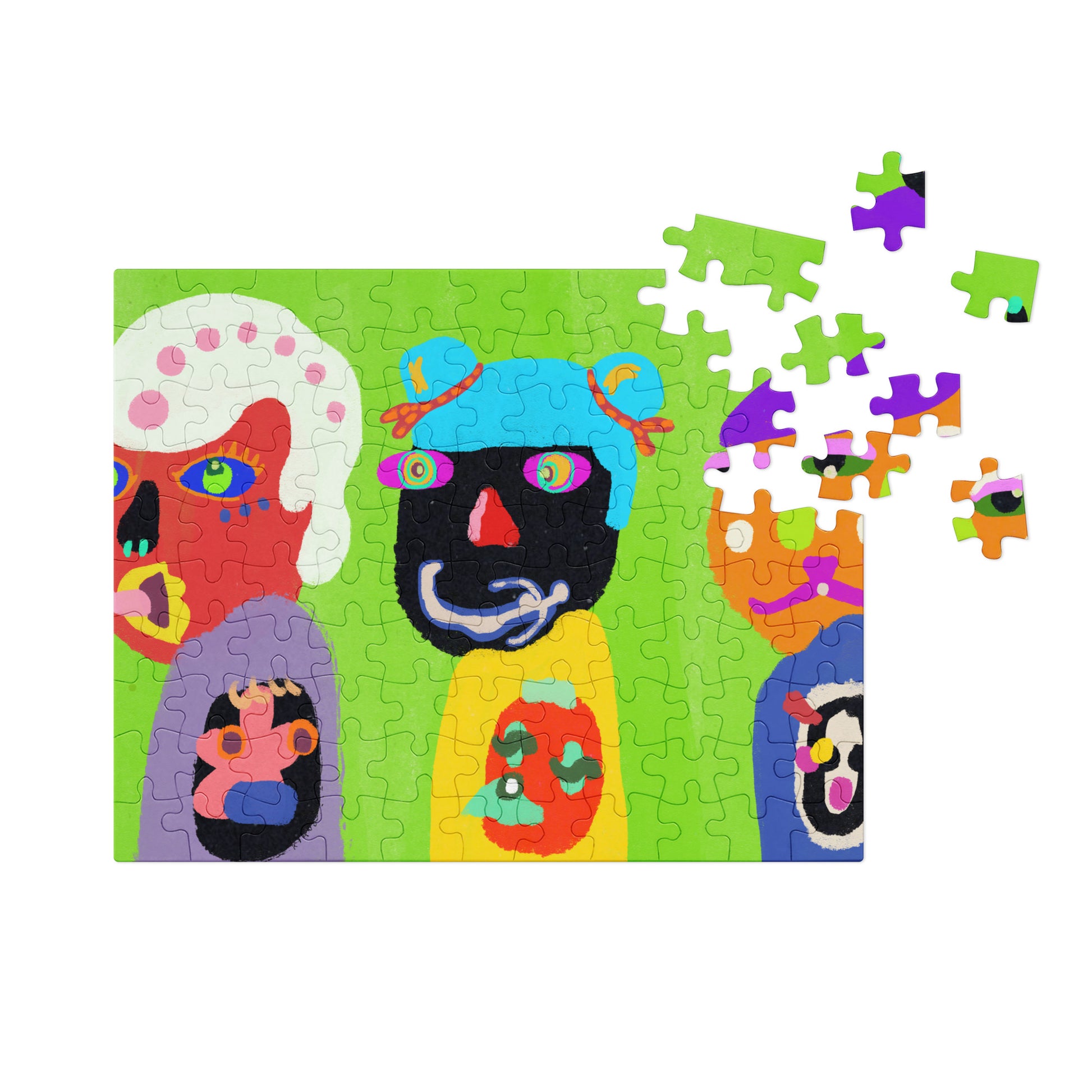 A vibrant jigsaw puzzle with the phrase "Don't Look Back" in bold, multicolored letters on a white background. The puzzle is partially assembled, showing the glossy finish of the pieces, and is displayed next to a sleek, gray tin box.