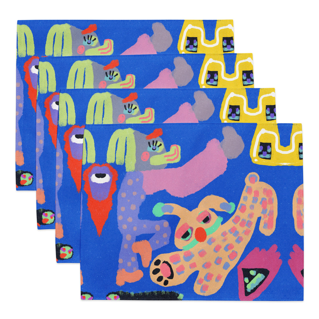 Stylish 4-piece placemat set showcasing bold, offbeat art, perfect for adding personality to meals with its easy-to-clean and water-resistant design.