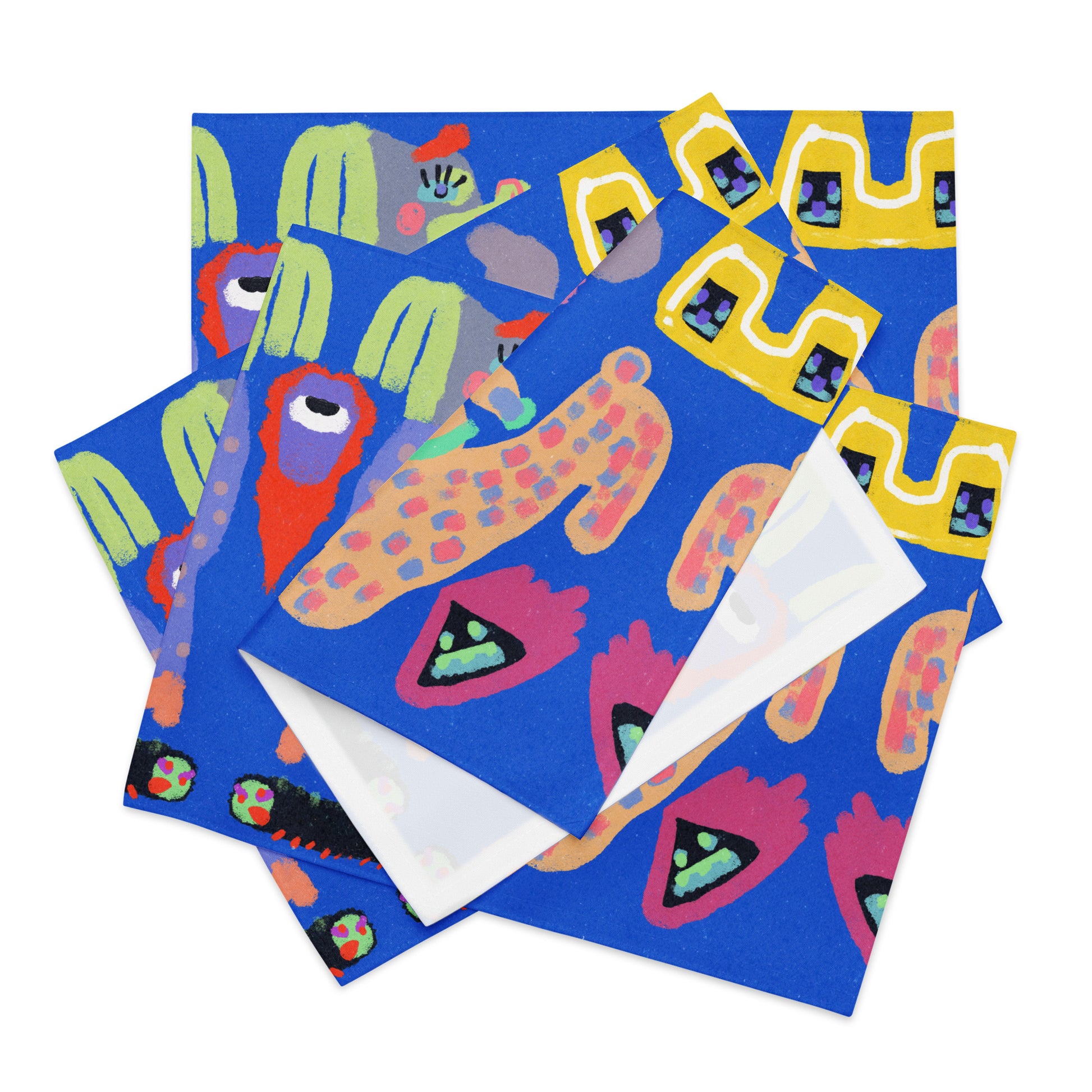 Stylish 4-piece placemat set showcasing bold, offbeat art, perfect for adding personality to meals with its easy-to-clean and water-resistant design.