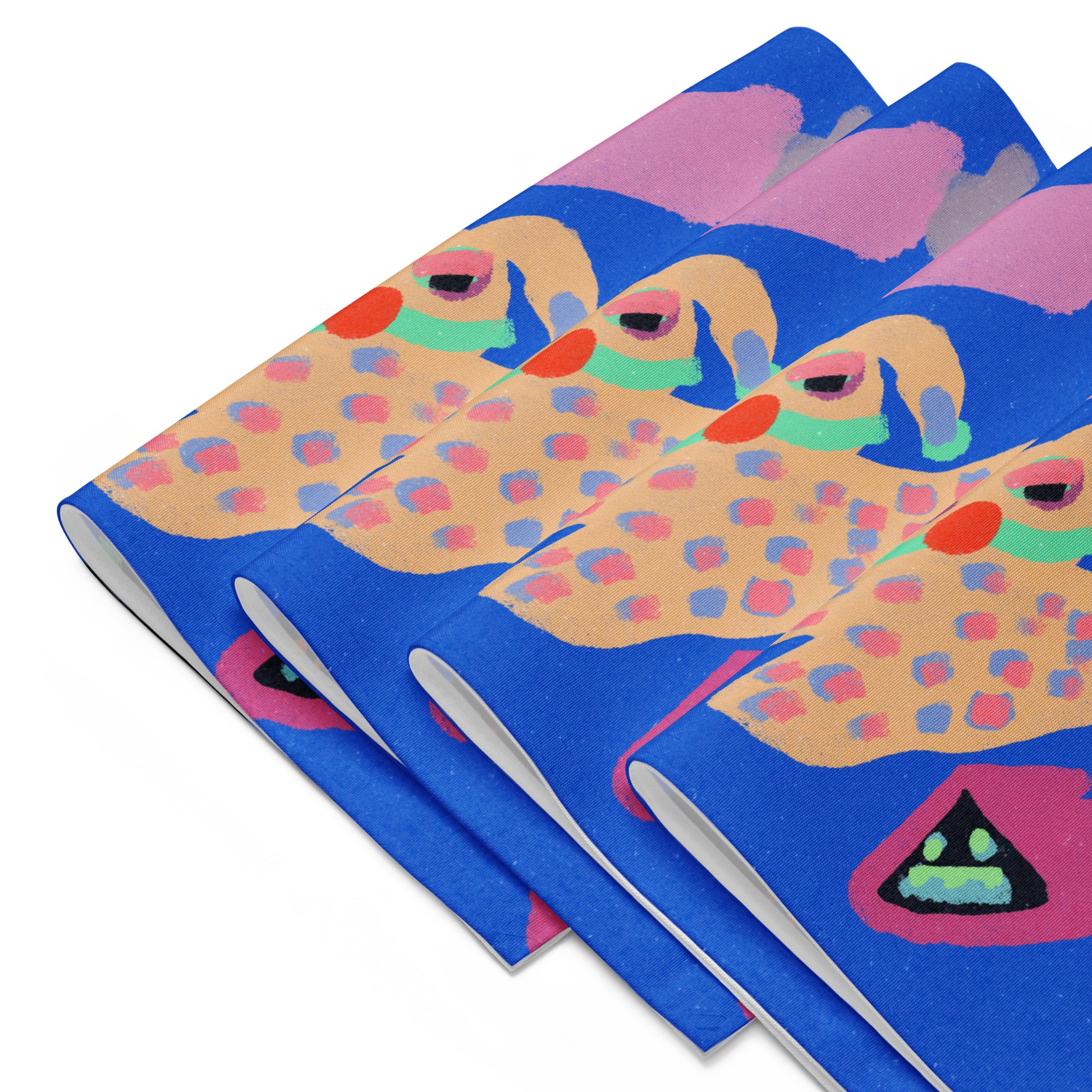 Stylish 4-piece placemat set showcasing bold, offbeat art, perfect for adding personality to meals with its easy-to-clean and water-resistant design.