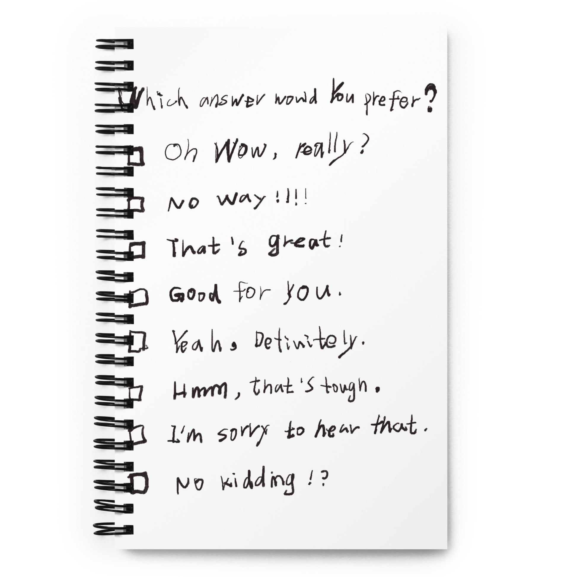 Spiral notebook with “Small Talk Checklist” design on the cover, wire-bound, open flat on a desk.