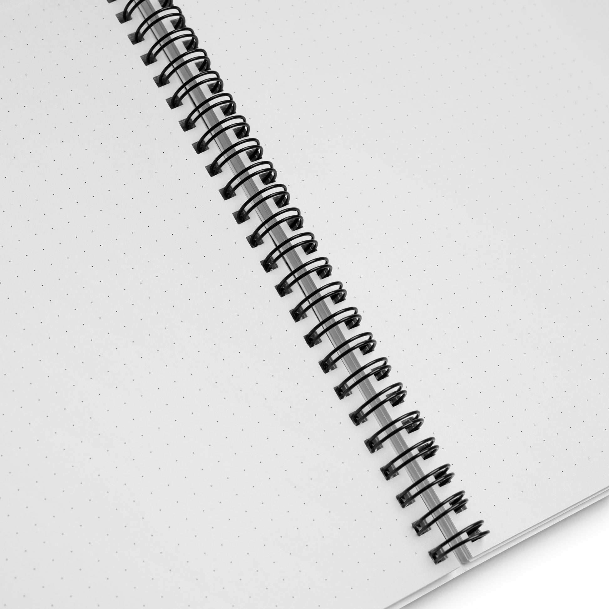 Spiral notebook with “Small Talk Checklist” design on the cover, wire-bound, open flat on a desk.